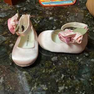 Stuart Weitzman pink satin rosette crib shoes
